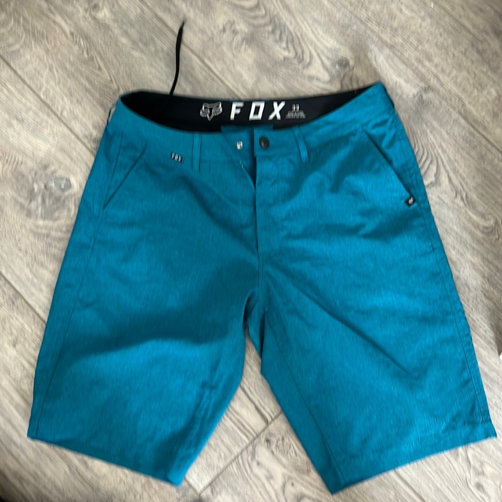 Men’s teal fox active shorts. 33” waist never worn